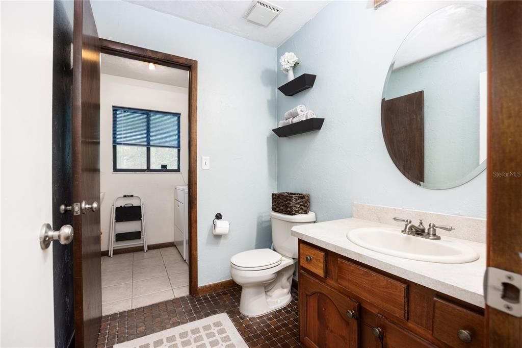 Half bathroom and access to laundry room