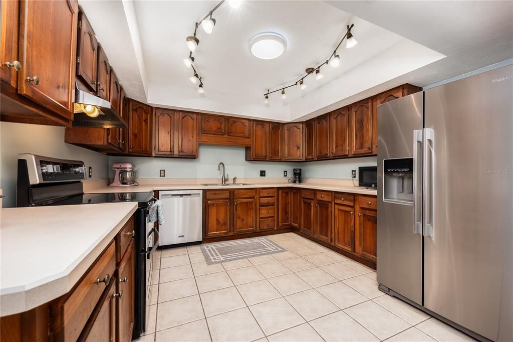 Large kitchen with lots of storage and updated stainless steel appliances