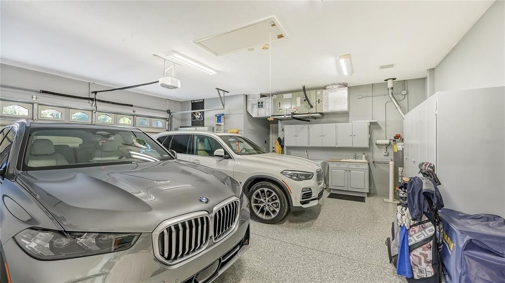 Oversized garage with gas hot water heater and 30 amp generator.