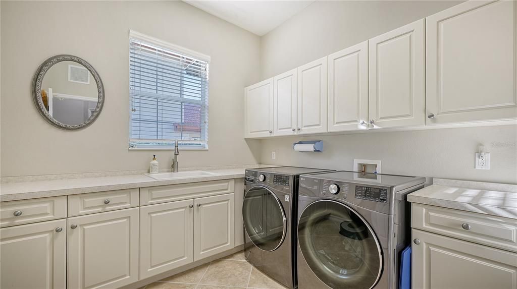 Expansive laundry room. 9X9 with utility sink