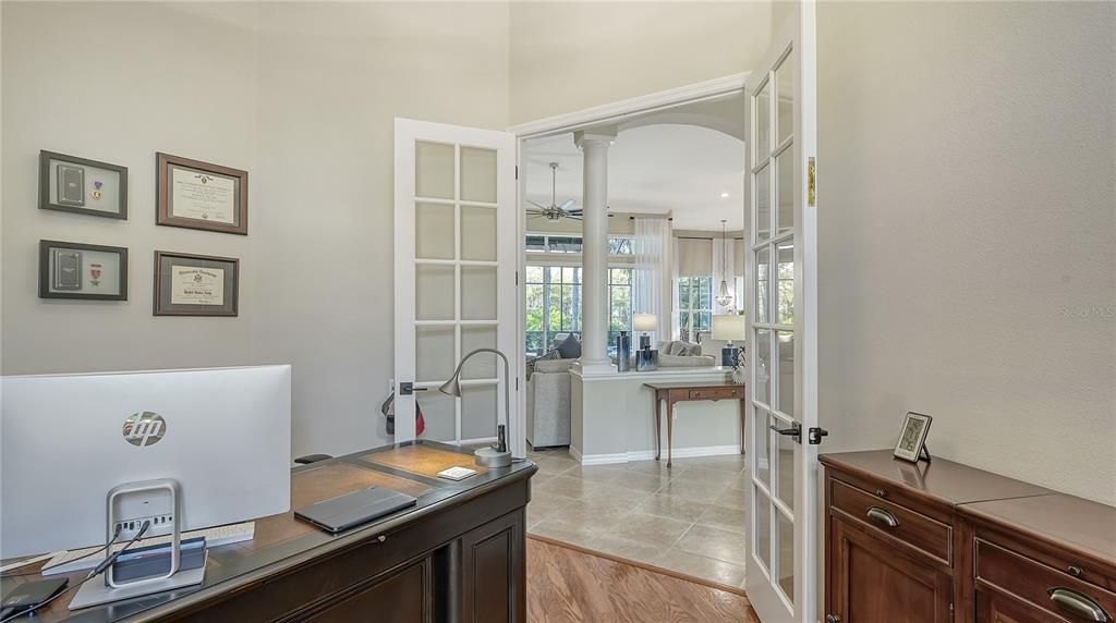 Office/den with French doors for privacy.