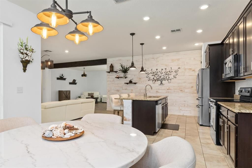 View from breakfast nook/dining area towards combination living room and family room.