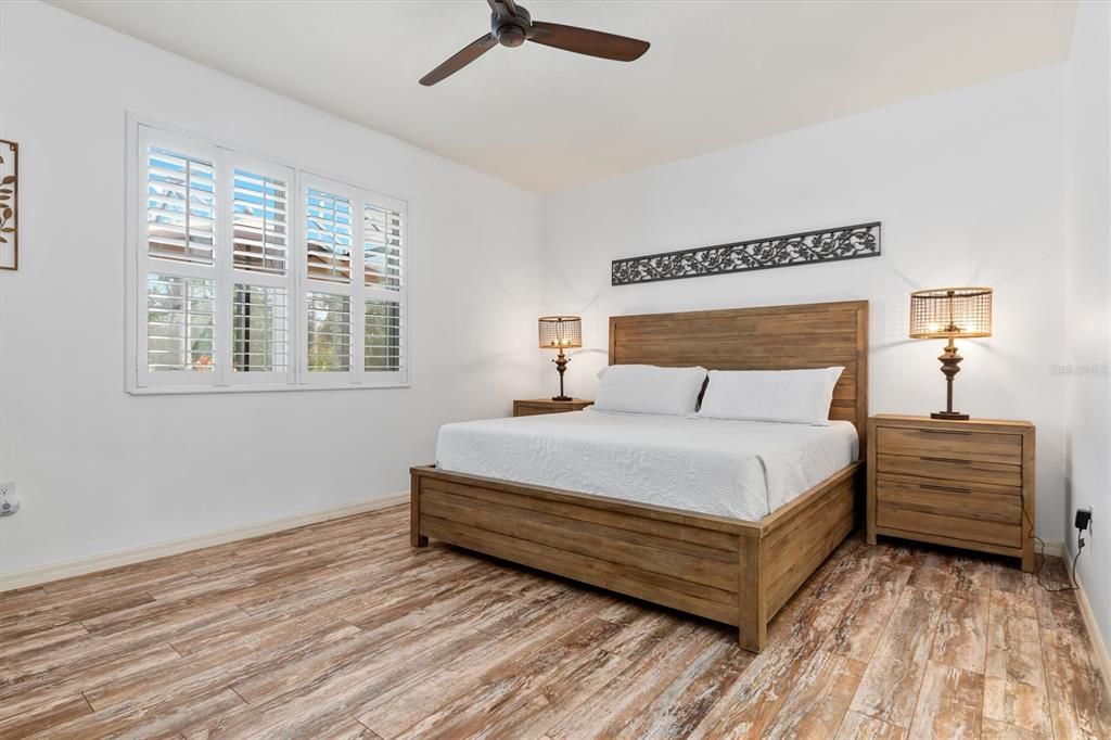 Primary bedroom with ensuite bath. Plantation shutters throughout the home.