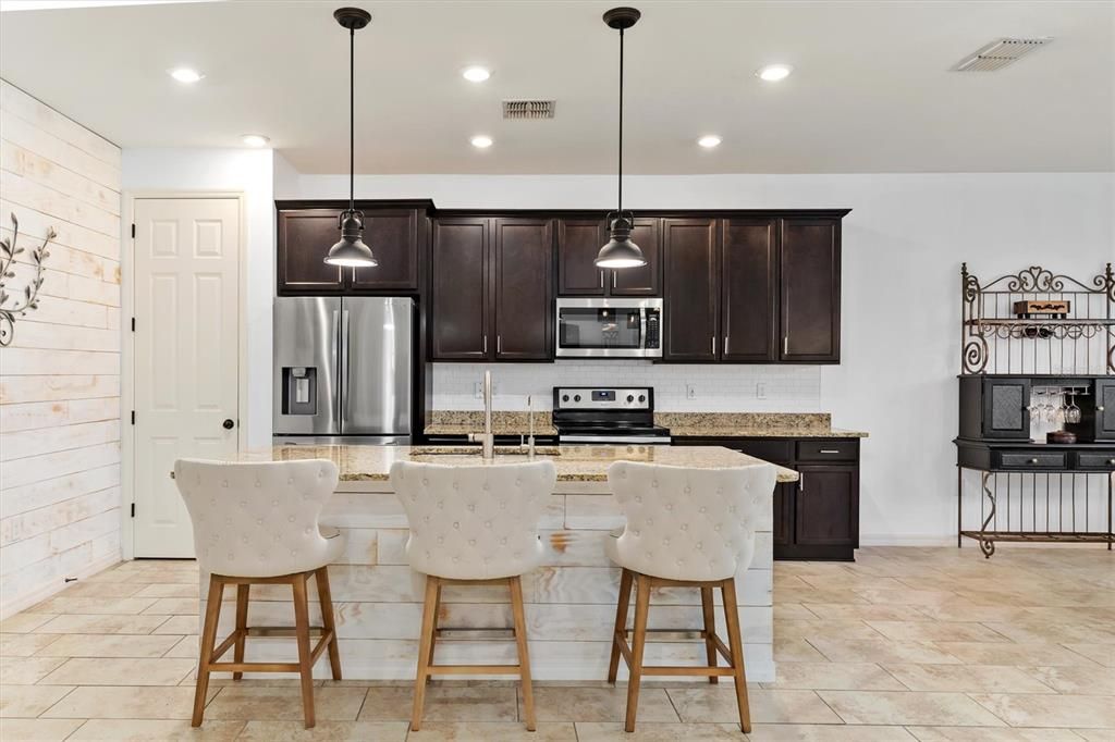 A dedicated closet pantry provides abundant food and small appliance storage.