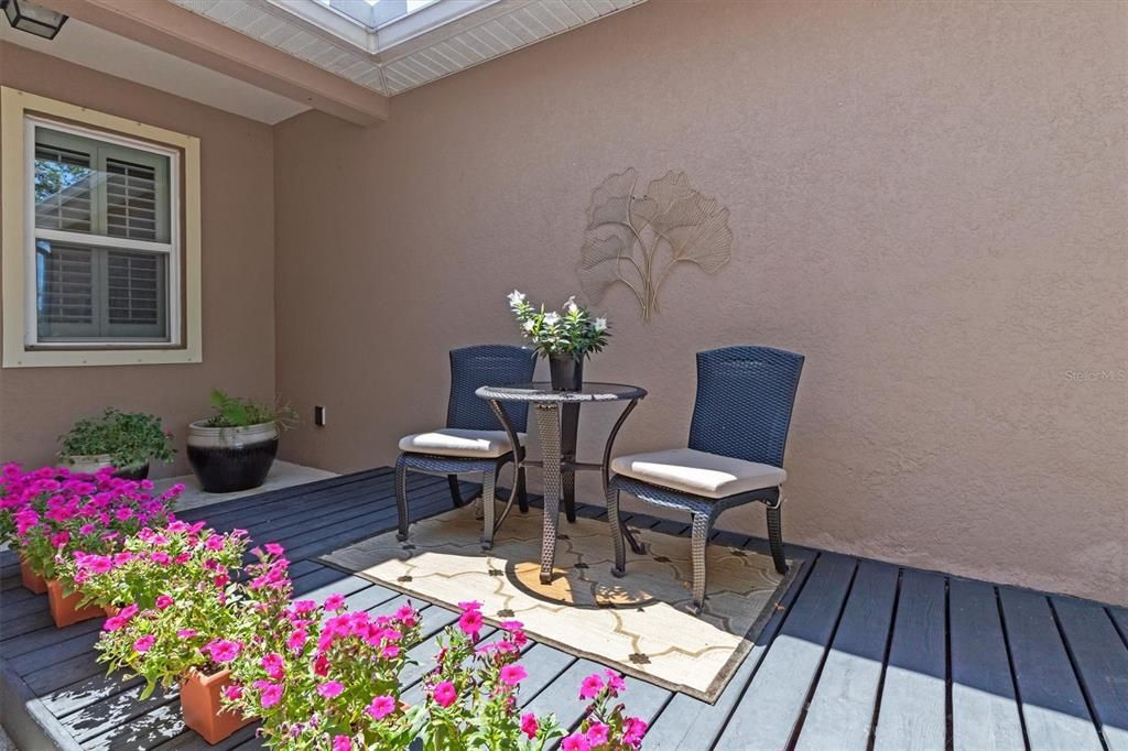 Can you picture relaxing with someone special, enjoying a cool drink and catching up on your front patio? You deserve to unwind and take in the beautiful surroundings.