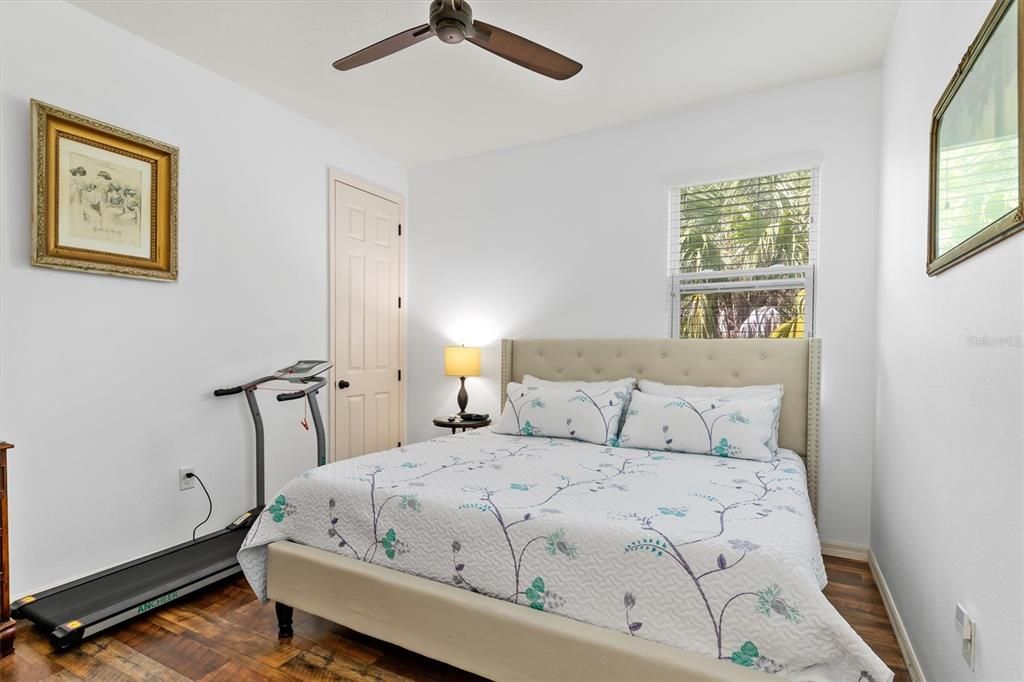 Guest bedroom with built-in closet.