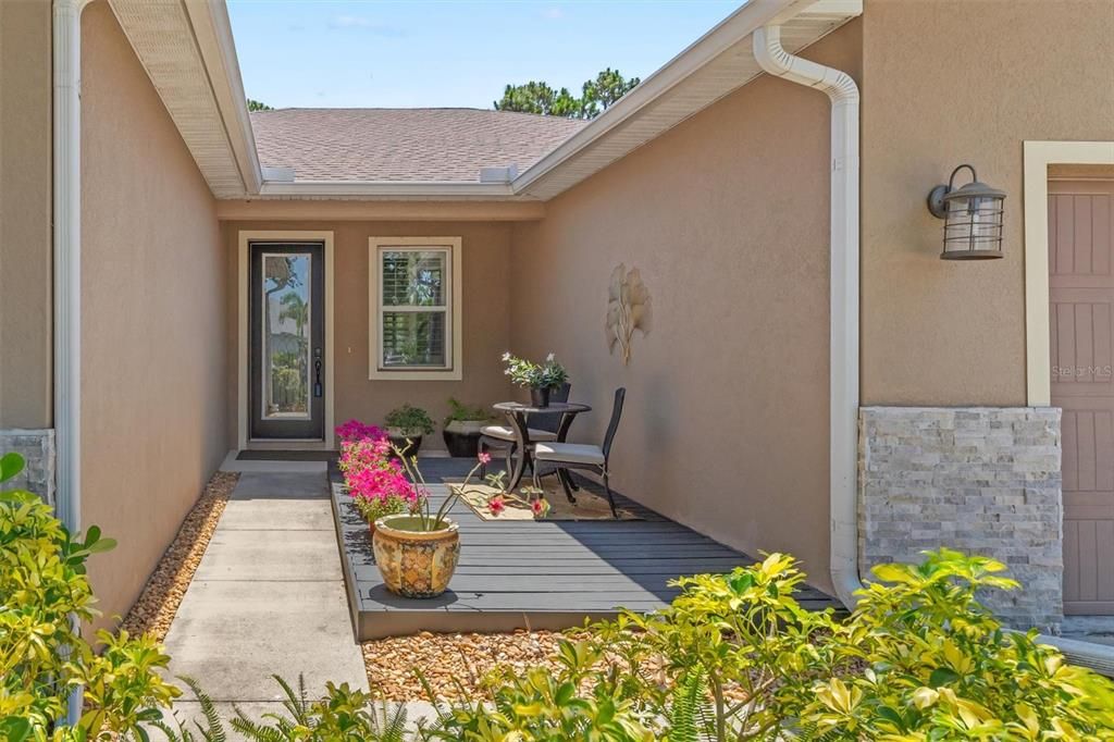 Quaint entry patio to enjoy the morning sun!