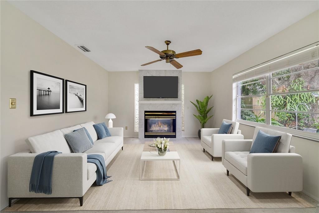 Follow the natural flow into a spacious living area complete with a gas FIREPLACE, large window and its own access to the outdoor living area; making gathering with family and entertaining friends a breeze! Virtually Staged.