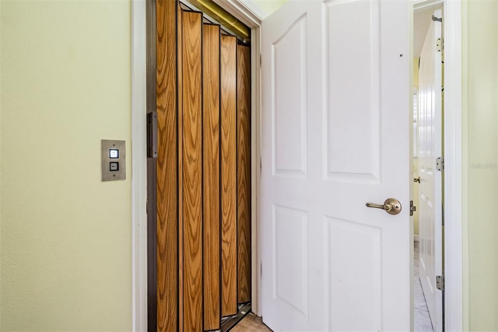 Elevator next to laundry room