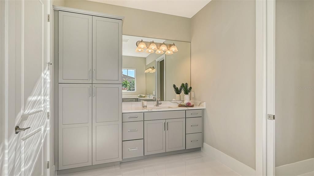 Reconfigured cabinets in this Sterling III for separate sides and sinks with fabulous storage