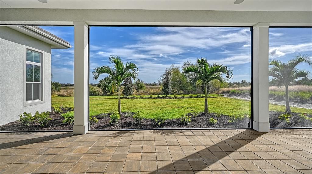 Lovely and oh so quiet view of the preserve from your covered and screened lanai
