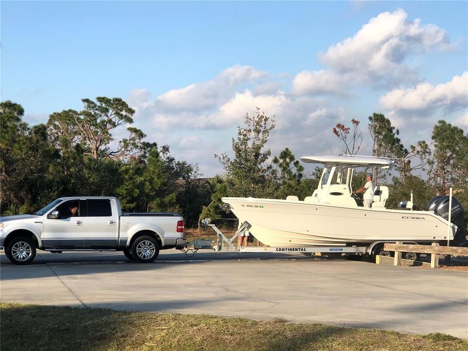 South Gulf Cove Resident Launches Their Boat Into the Santa Cruz Waterway