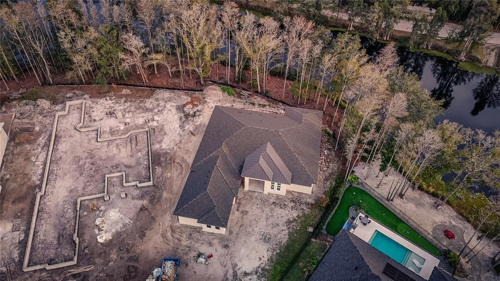 Aerial view with view of water access to Lake Padgett in backyard!