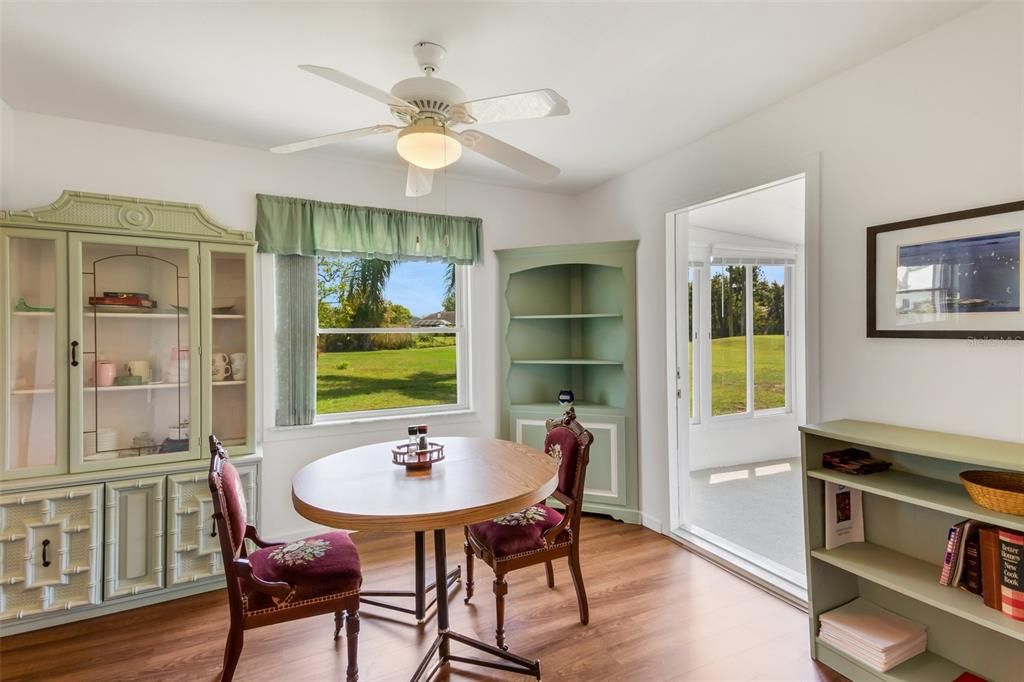 That additional room you might have seen in a previous photo is just off the Family Room, and is the casual dining area, hobby room, card room, or just about anuthing you desire. That door leads to the enclosed lanai...with THAT view.
