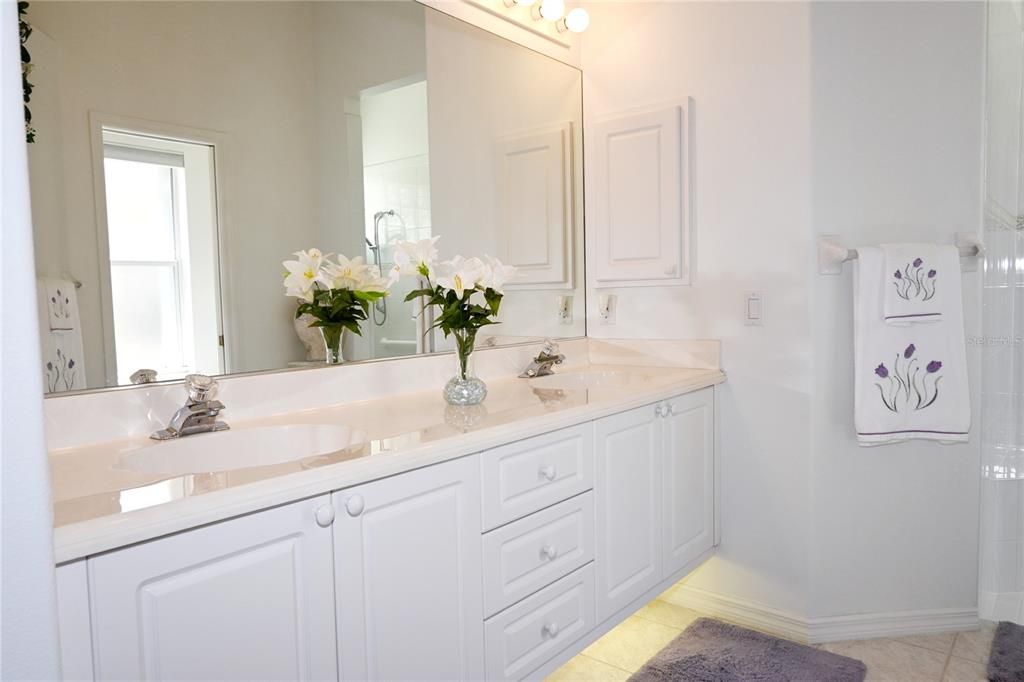 Light and bright primary bathroom with double sink