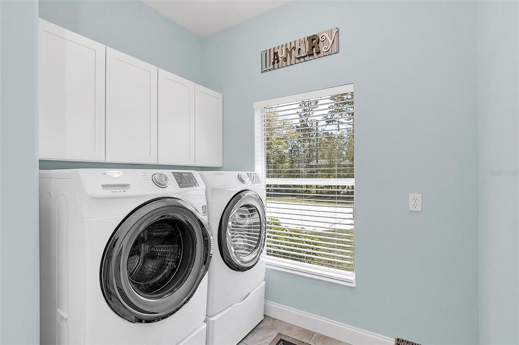 Laundry Room with Linen Closet