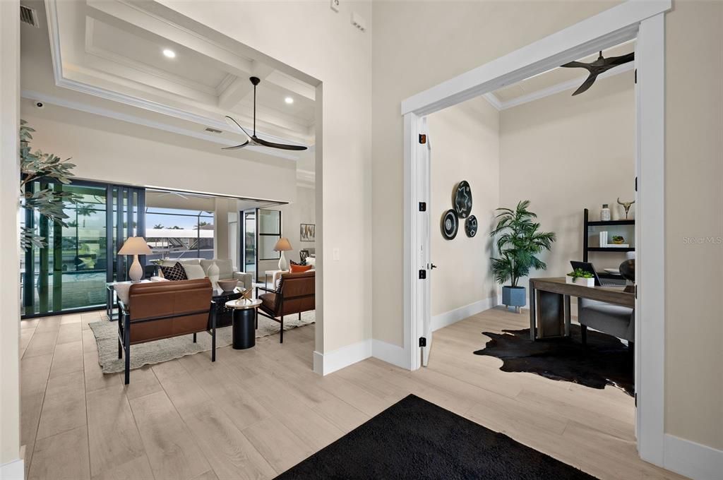 Entryway with view of the office and Living Room