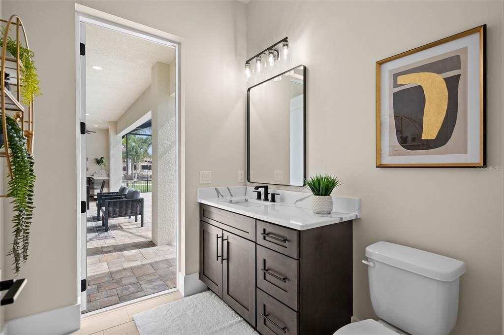 Bathroom with access to the pool.