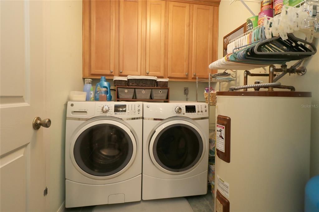 Inside laundry with NEW washer & dryer.