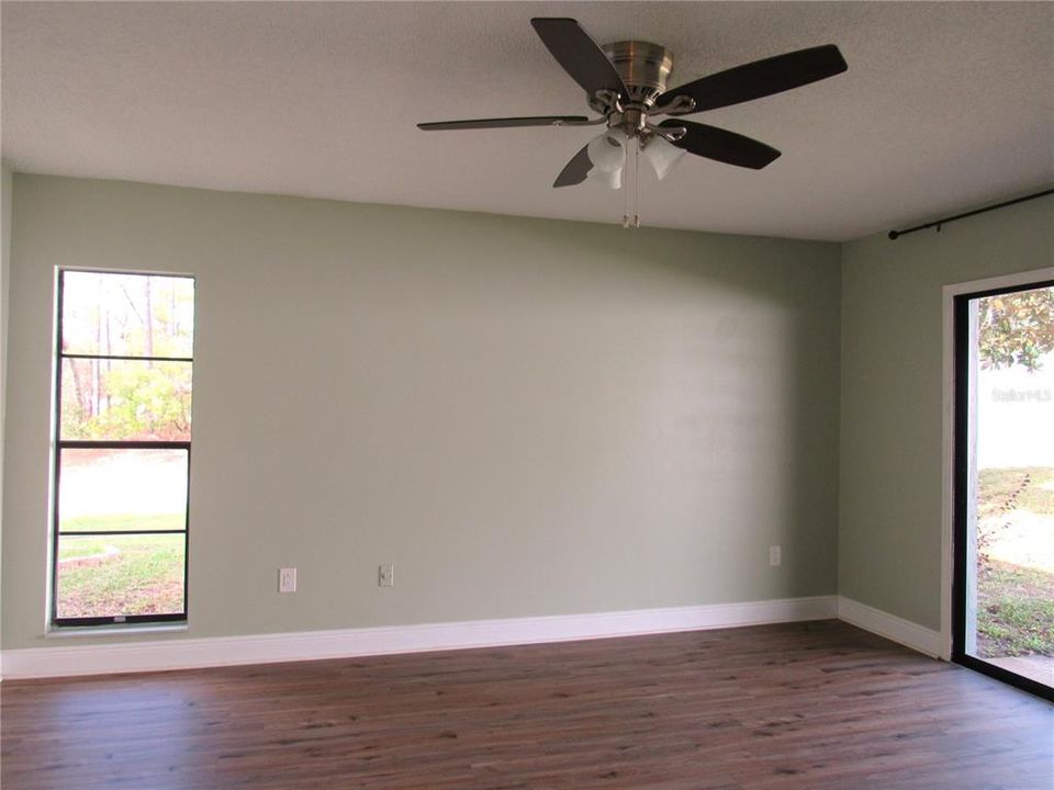 Spacious Primary Bedroom w/ Great Wall Space and  En~Suite Bath. Beautiful Views of The Great Outdoors!!