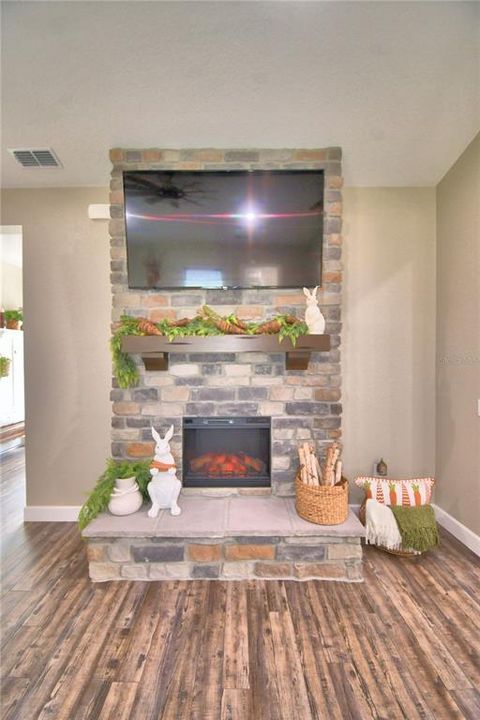 Gorgeous Fireplace with Stone Surround