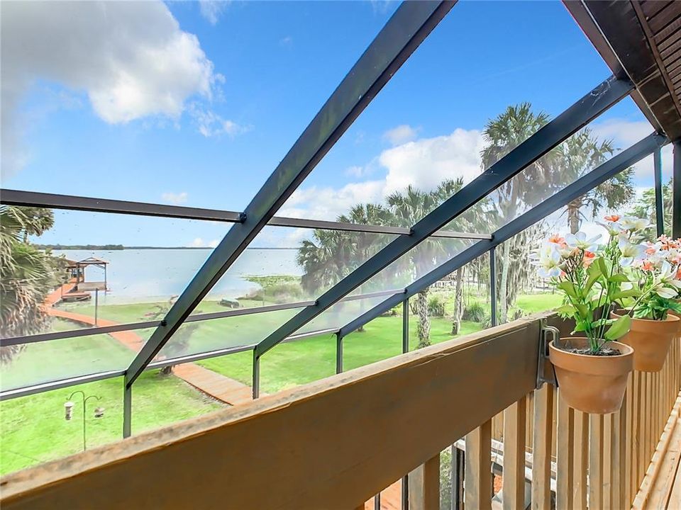 Upstairs porch has an amazing view of Lake Pierce.