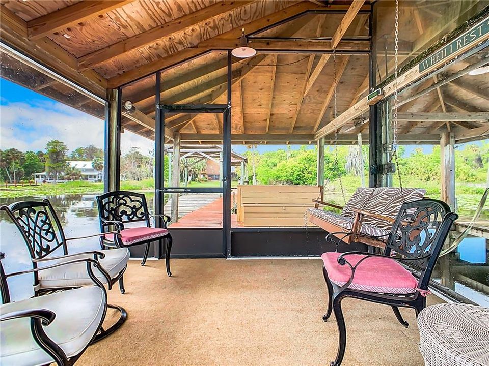 Screened porch at the end of the dock.