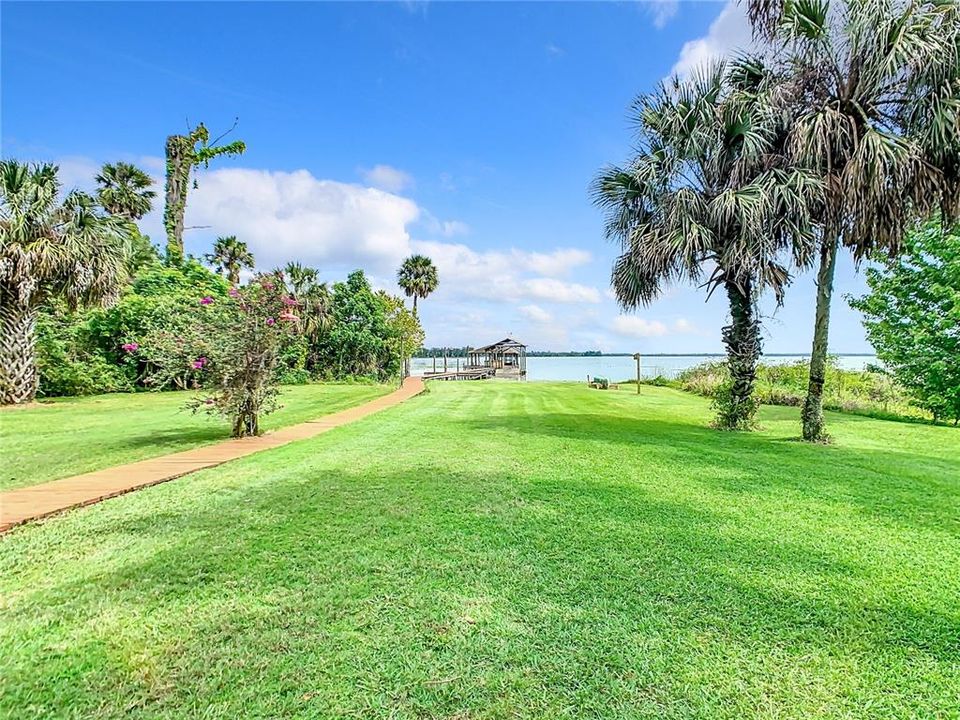 Located on over a acre of land with mature landscaping and privacy galore.