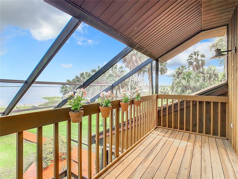 Screened porch/balcony off the primary bedroom.