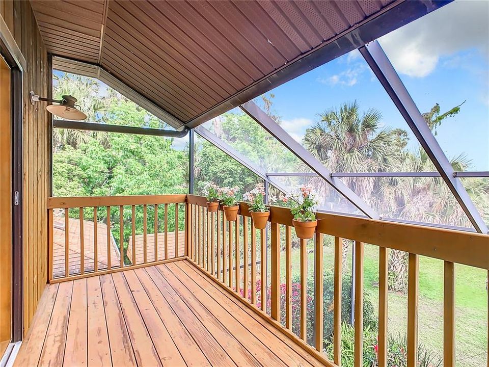 Upstairs porch has an amazing view of Lake Pierce.