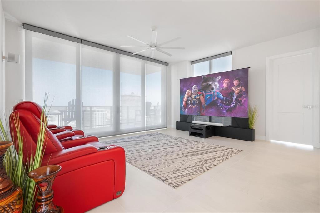 120” state-of-the-art projection TV that rises from the floor and a Sonos surround sound system.