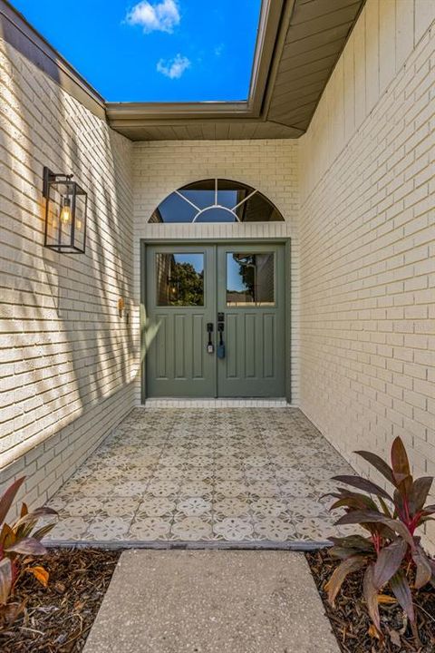 Front entry with mosaic tile