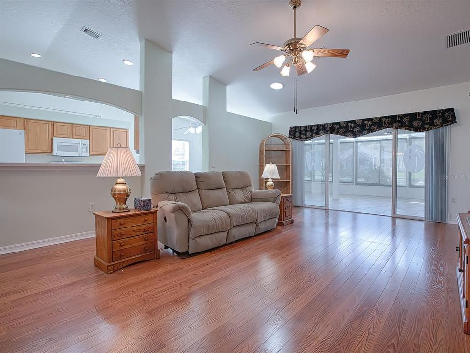 GORGEOUS FLOORING THROUGHOUT! NOTE THE BREAKFAST BAR WITH PASSTHROUGH AND BUILT-IN WALL   CUTOUTS