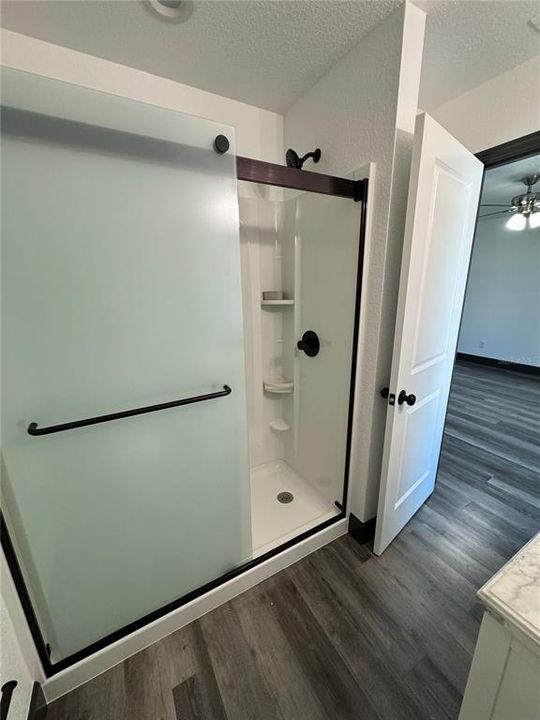 MASTER BEDROOM SHOWER (MODEL HOME COLORS AND FIXTURES SUBJECT TO CHANGE)