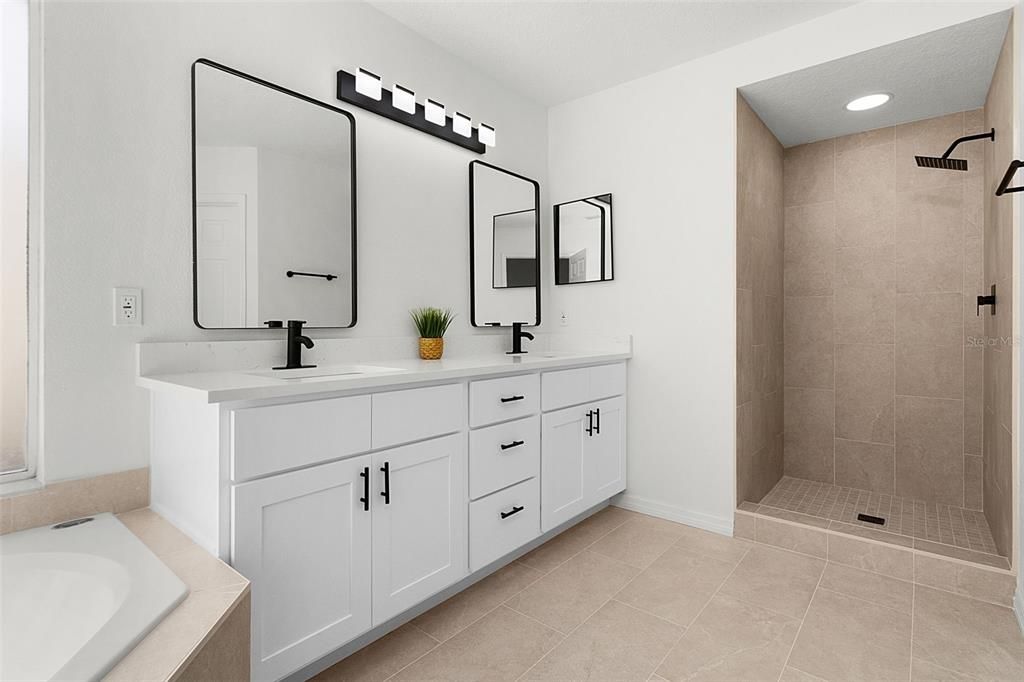 OWNER BATHROOM with GARDEN TUB, a Great sized SHOWER, DUAL SINKS with QUARTZ COUNTERTOPS, and a separate walk-in CLOSET