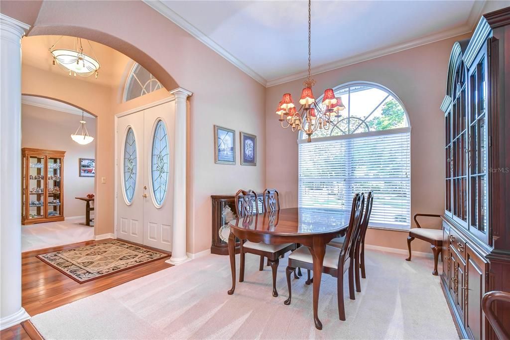 Dining room has so much space for formal meals!