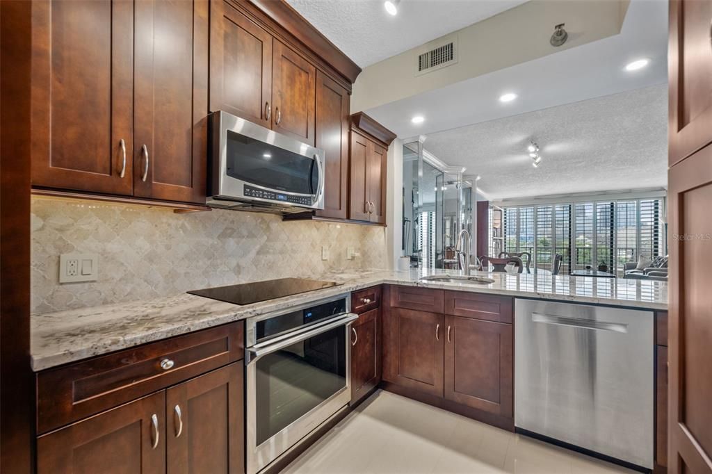 Renovated kitchen with gorgeous soft-close cabinets and stainless steel appliances
