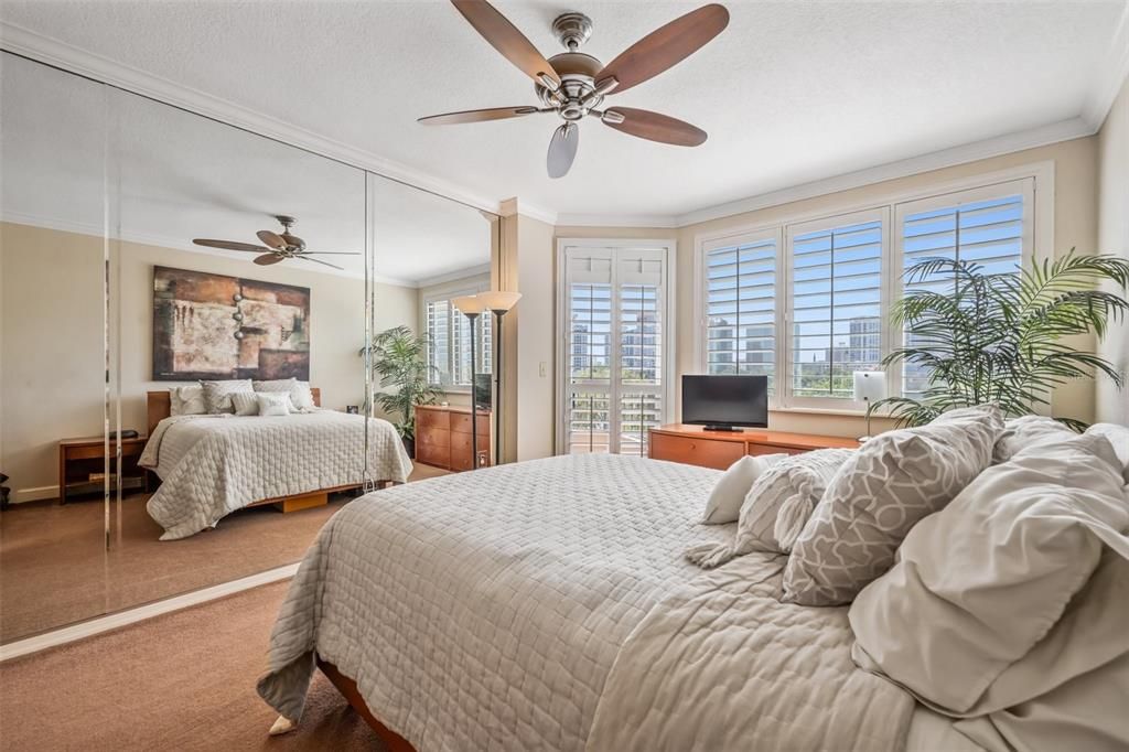 Primary bedroom with stunning views of Downtown Orlando