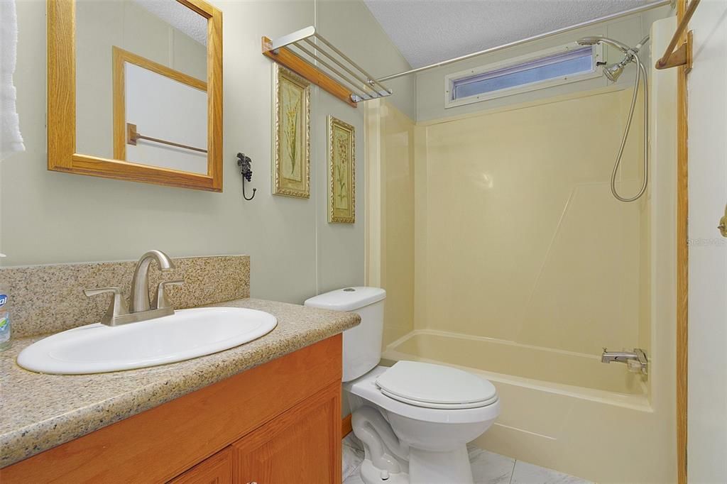 Bathroom 2 with a shower/bathtub combination