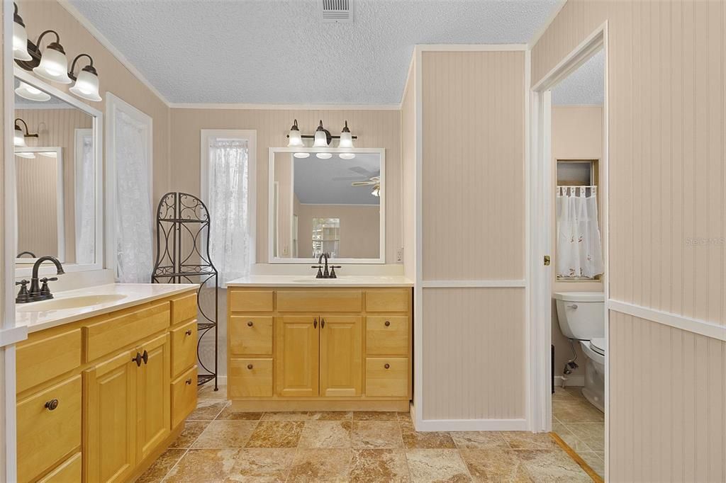 Dual vanity and separate water closet