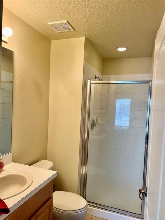 Primary bath with walk in shower.