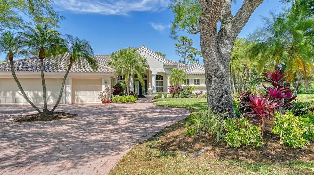 Circle driveway and 3 car garage