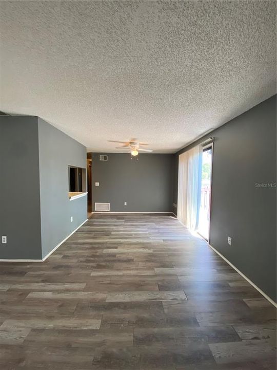 Living Area - Cabinets and Walls have FRESH PAINT - Walls are LIGHT GRAY in COLOR