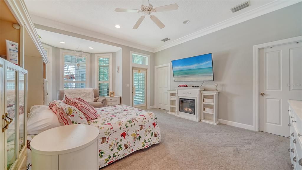 Master Bedroom leads to a private sun room for relaxing and privacy