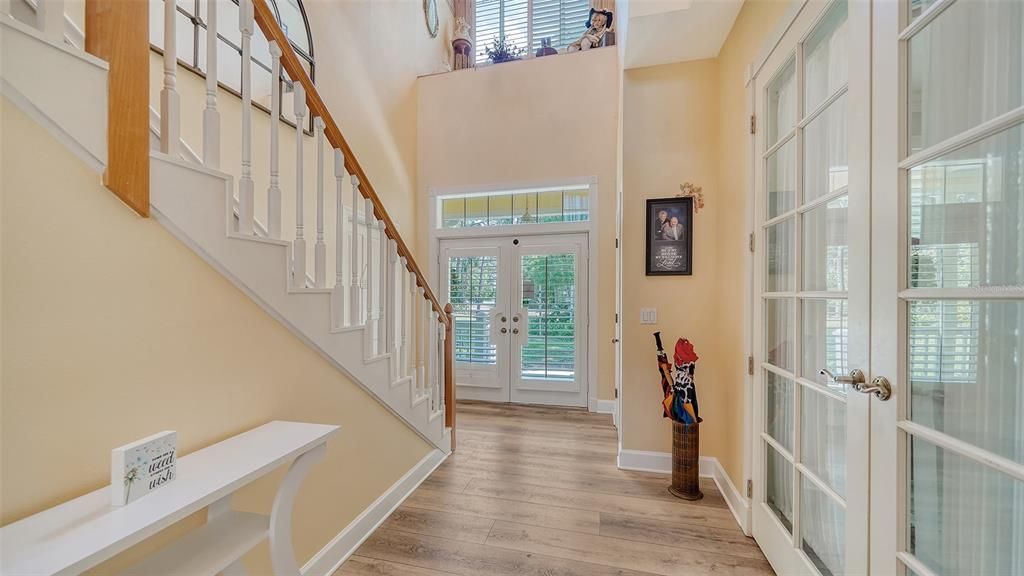 Formal entry, French doors to the right were added by this owner and lead to the formal dining room