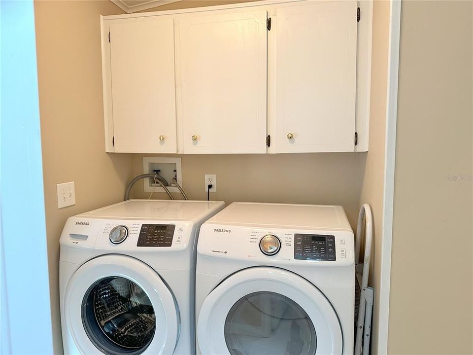 New Washer & Dryer with cabinets