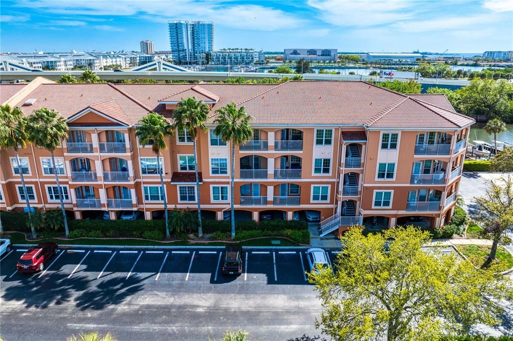 Welcome home! This is building 8. There is covered resident parking under the building as well as loads of additional spaces throughout the community.