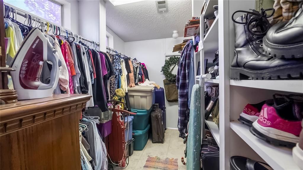 HUGE walk through closet connecting the 2 primary bathrooms