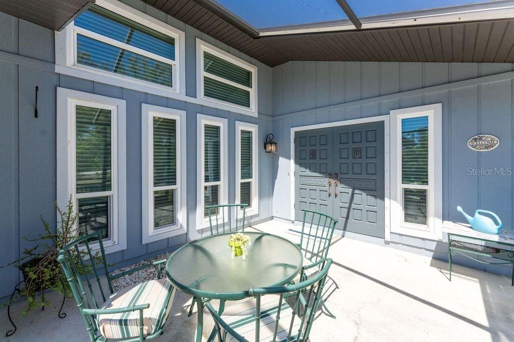Beautiful for your morning coffee and breakfast on the front screened in Porch