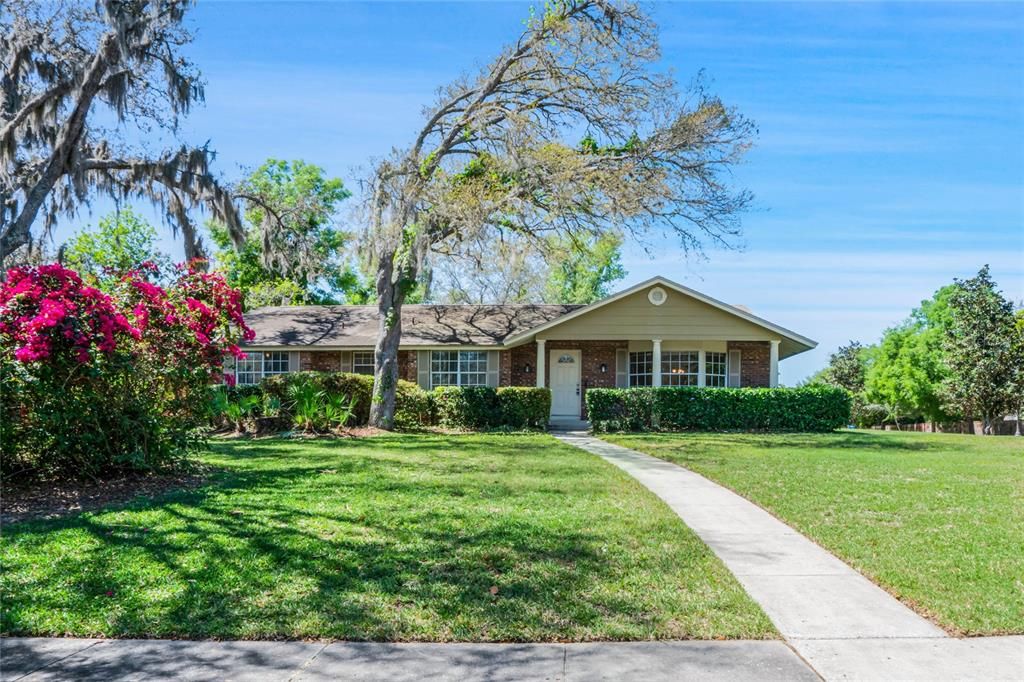 Tucked away on the tree-lined streets of Tuscawilla this 4-bedroom, 2.5-bath POOL HOME sits on a HALF ACRE CORNER LOT and features a NEWER ROOF, UPDATED A/C and space to park your BOAT or RV!